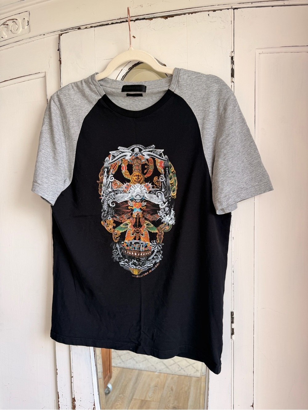 Alexander McQueen Black Raglan Tee with Gray Sleeves and Ornate Skull Motif